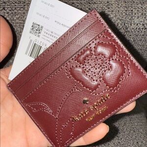 kate spade burgundy floral embossed cardholder